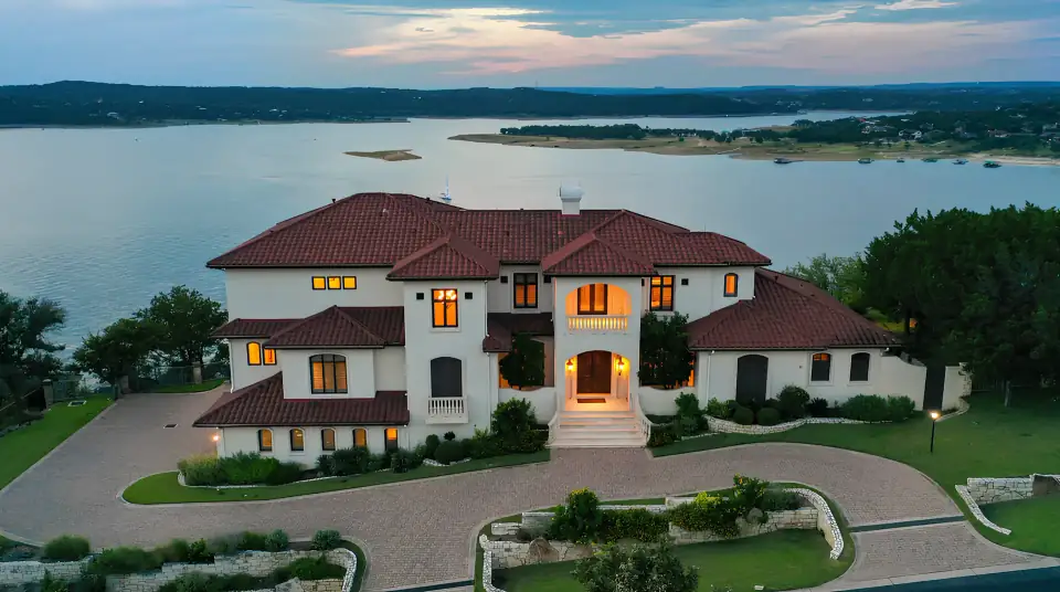Lakeway home with a red tile roof overlooking Lake Travis
